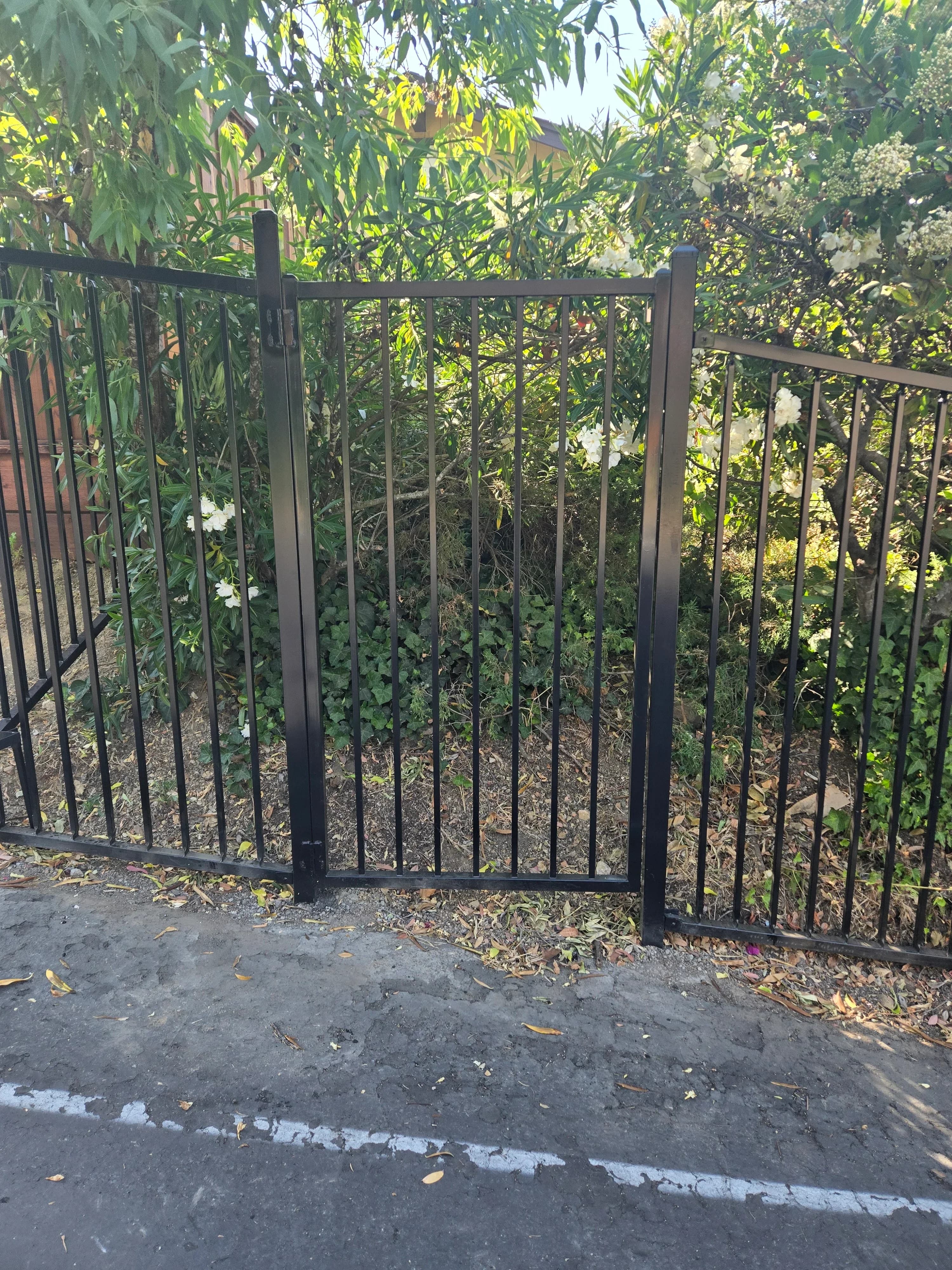 Vertical bar iron gate installation by SF Bay Automatic Gates