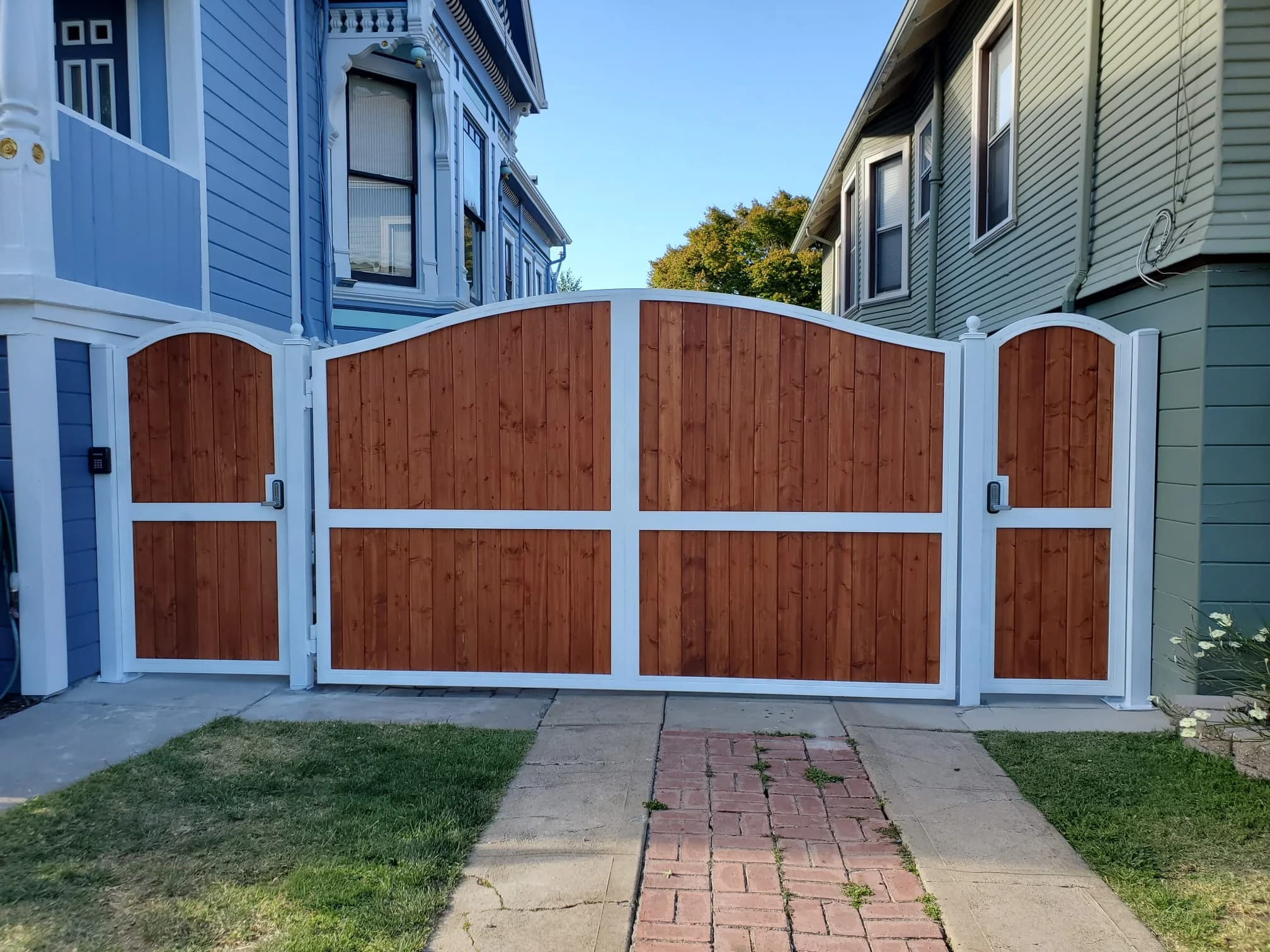Wooden panel driveway gate installation by SF Bay Automatic Gates