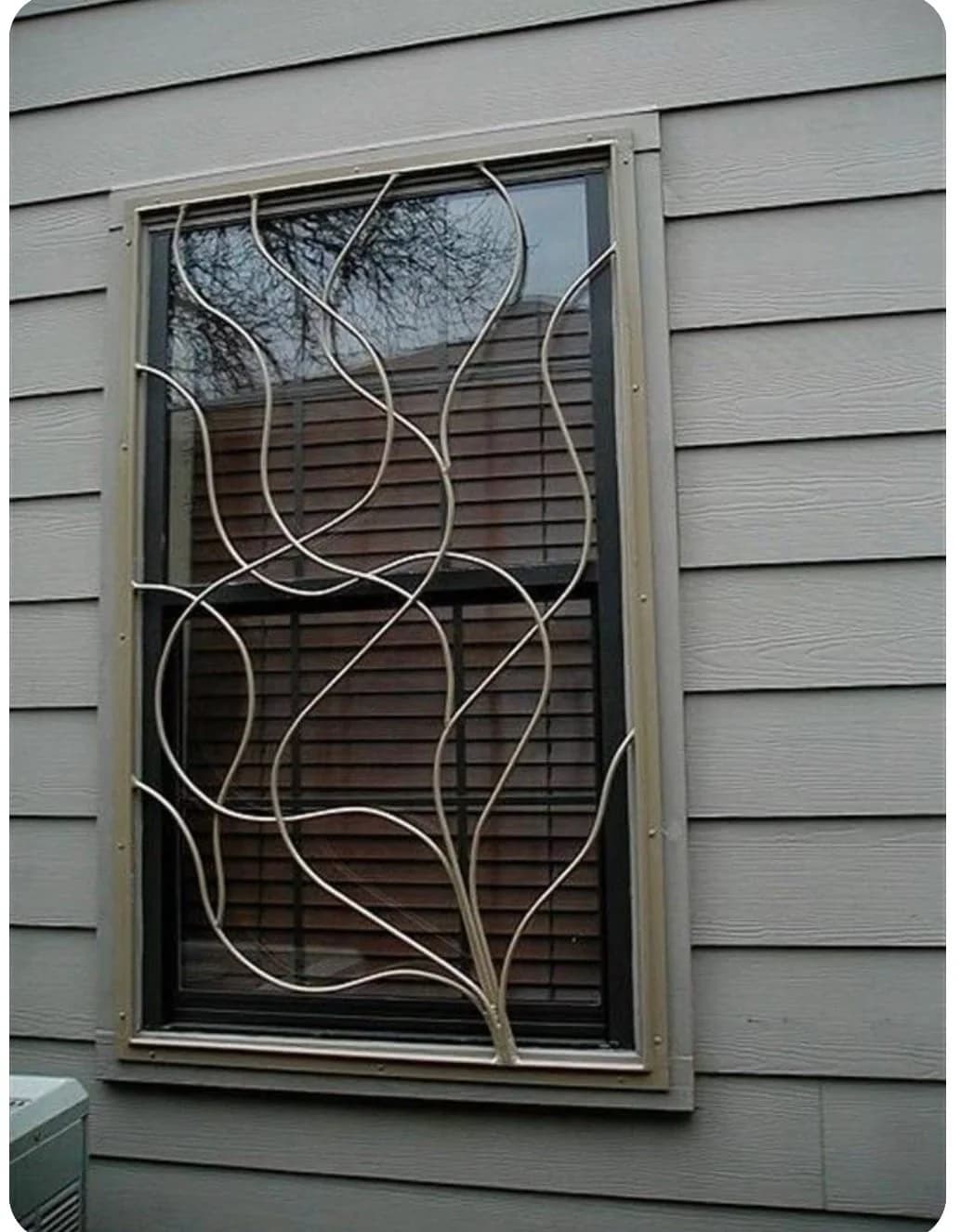 Decorative iron window security grill by SF Bay Automatic Gates